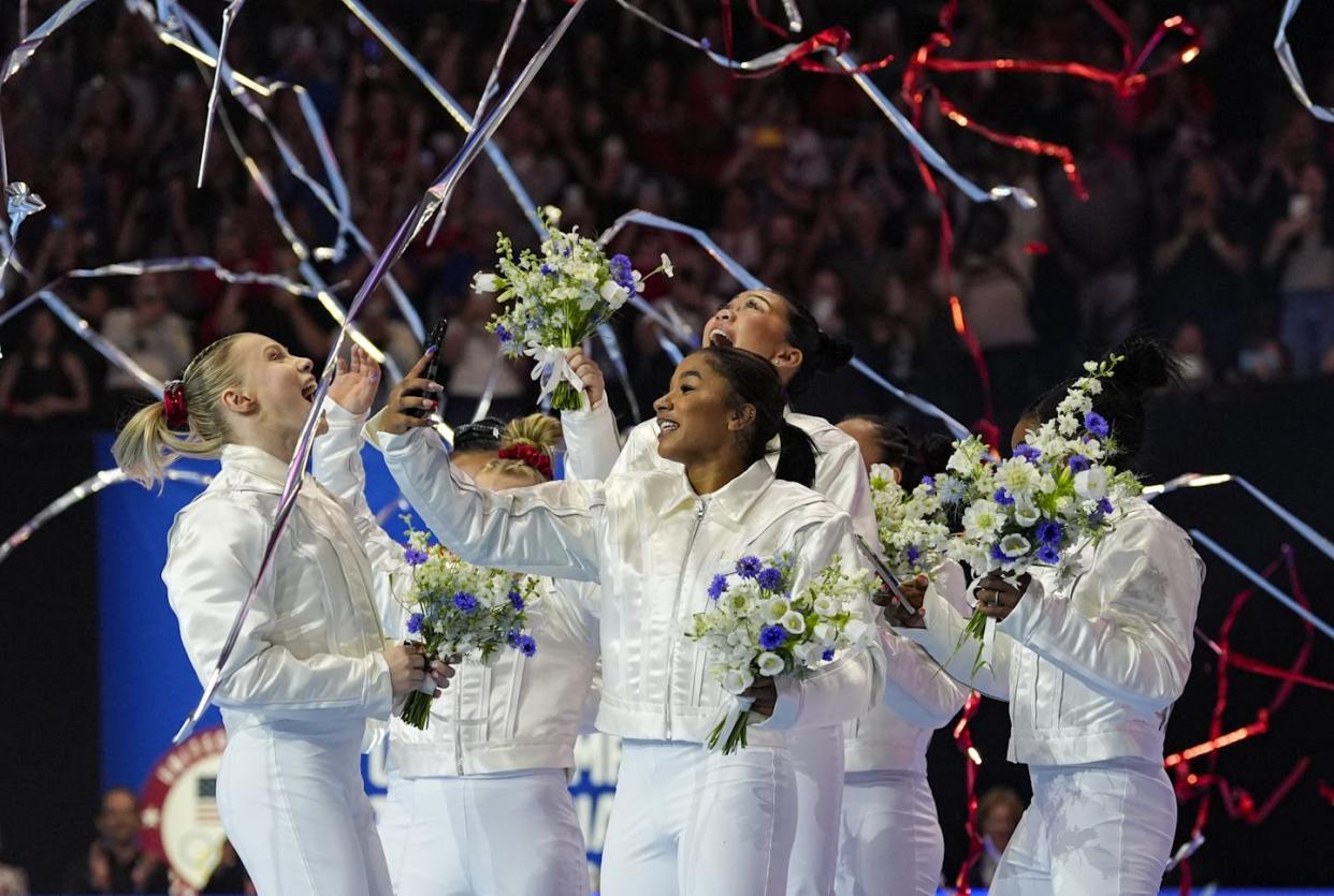 The U.S. gymnastics team selected for the 2024 Paris Olympics celebrates in Minneapolis. <a href="https://newsroom.ap.org/detail/USTrialsGymnastics/abf3c156e3c74ffdbf5d76e0c72ab85e/photo?Query=paris%20olympics&mediaType=photo&sortBy=&dateRange=Anytime&totalCount=5655&currentItemNo=11" rel="nofollow noopener" target="_blank" data-ylk="slk:AP Photo/Abbie Parr;elm:context_link;itc:0;sec:content-canvas" class="link ">AP Photo/Abbie Parr</a>