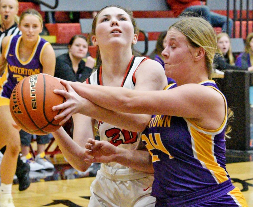 Watertown's Jade Lund blocks the shot of Yankton's Camryn Koletzky during their Eastern South Dakota Conference girls basketball game on Thursday, Jan. 12, 2023 at the Yankton High School Gym.