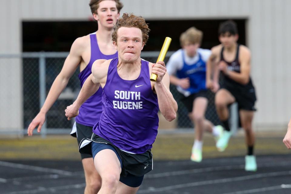 South Eugene’s Boden Hanley charges down the home stretch of the 4x100 relay during a track meet at Churchill High School Wednesday, April 19, 2023, in Eugene.