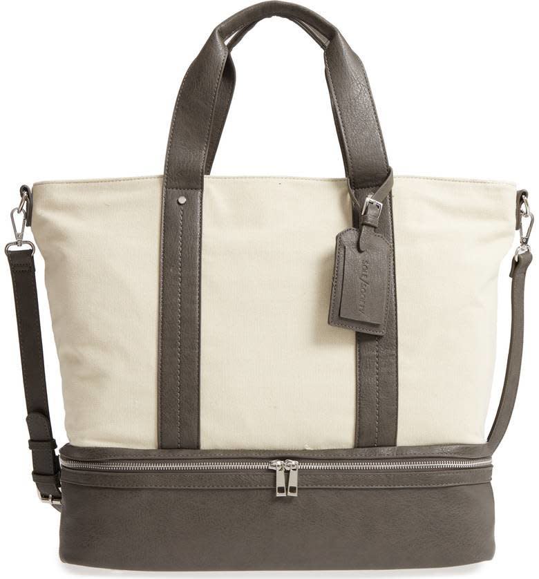 Get it on <a href="https://shop.nordstrom.com/s/sole-society-canvas-overnight-tote/4932063?origin=keywordsearch-personalizedsort&amp;fashioncolor=NATURAL%20COMBO" target="_blank">Nordstrom</a>, $75.