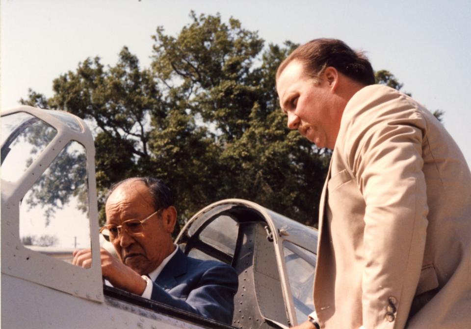 Buddy Macon with Sadamu Komachi as the Japanese fighter ace sits in the cockpit of a Zero fighters for the first time since World War II.