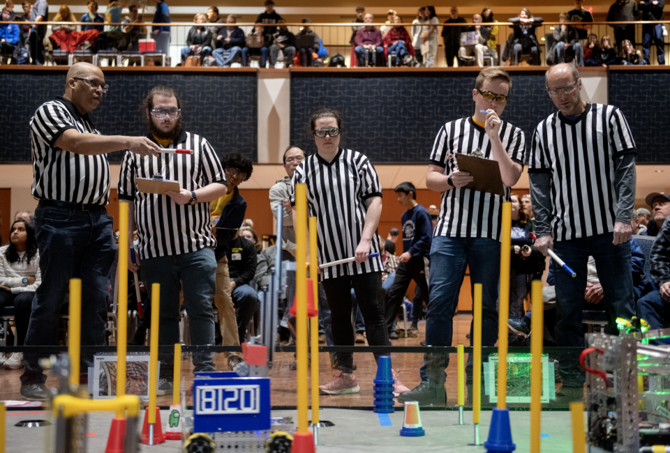 Judges during a qualification round match.