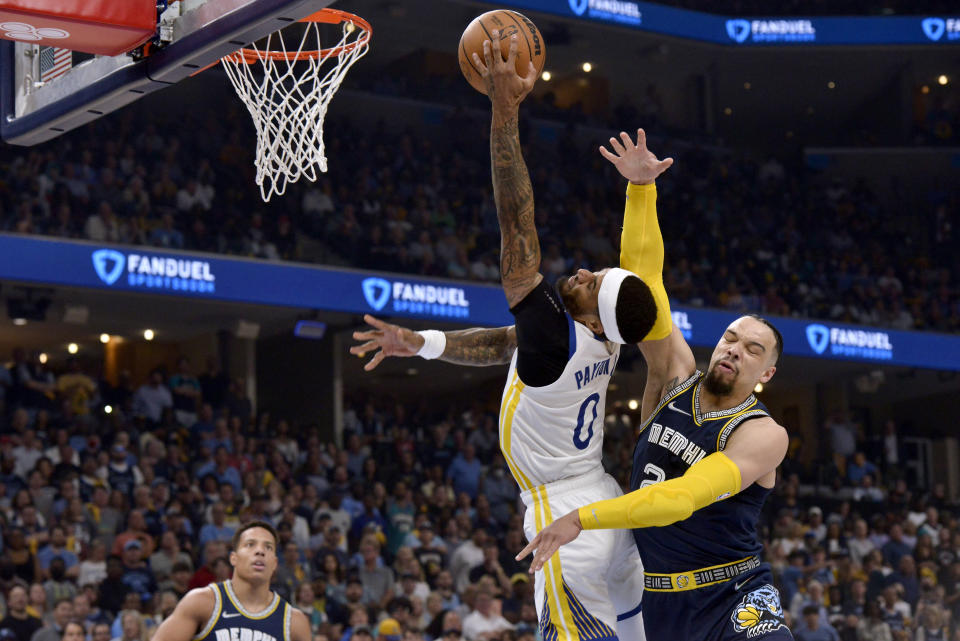 Memphis Grizzlies forward Dillon Brooks (24) fouls Golden State Warriors guard Gary Payton II (0) during the first half of Game 2 of a second-round NBA basketball playoff series Tuesday, May 3, 2022, in Memphis, Tenn. Brooks was ejected. (AP Photo/Brandon Dill)