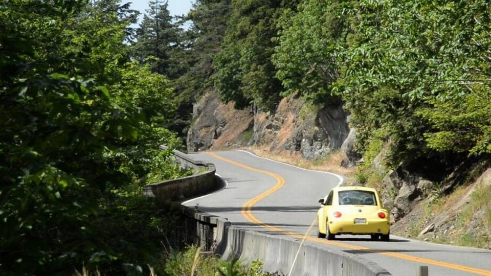 Much of Chuckanut Drive is a narrow-two lane road that hugs the sandstone cliffs of the Chuckanut Mountains. State Route 11 officially opened in 1916.