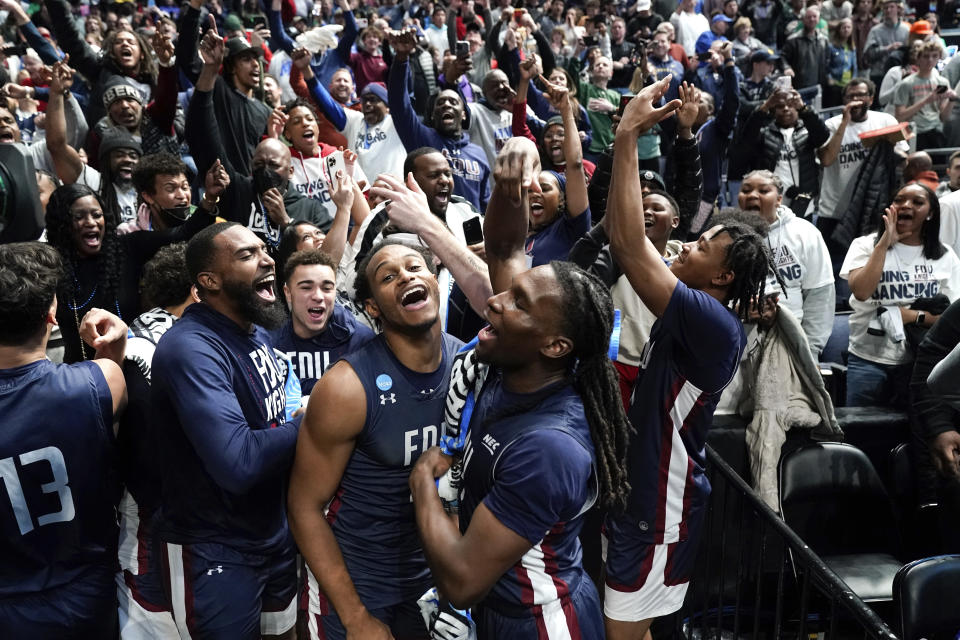 Fairleigh Dickinson players celebrate beating Purdue 63-58 after a first-round college basketball game in the NCAA Tournament Friday, March 17, 2023, in Columbus, Ohio. (AP Photo/Paul Sancya)