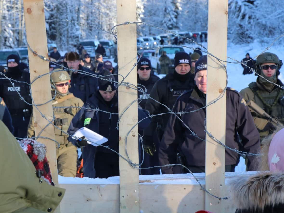 On Jan. 7, 2019, RCMP enforced an injunction ordering people to stop preventing Coastal GasLink workers from accessing a road and bridge. (Chantelle Bellrichard/CBC - image credit)