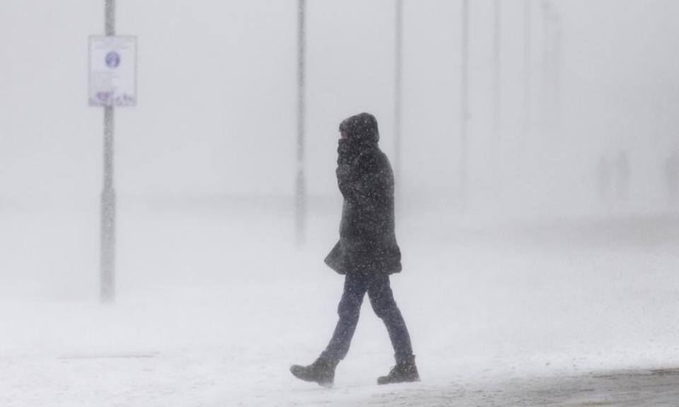 A walk along a snow-covered Portobello beach during a snow storm