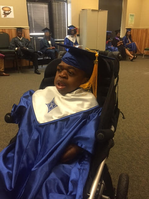 Khye Jessup, who has a rare genetic disorder with a short life expectancy, at graduation. (Photo: Shelley Mason)