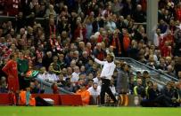 Britain Football Soccer - Liverpool v Villarreal - UEFA Europa League Semi Final Second Leg - Anfield, Liverpool, England - 5/5/16 Liverpool manager Juergen Klopp gestures to fans as Lucas Leiva waits to come on as a substitute Reuters / Phil Noble Livepic