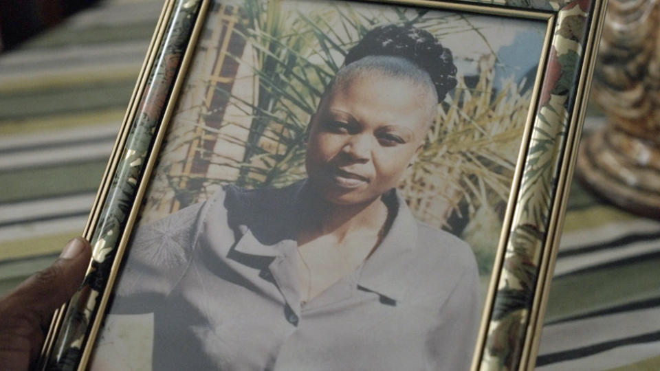 A framed photo of Llwandle Mkhulisi's sister Pumzile