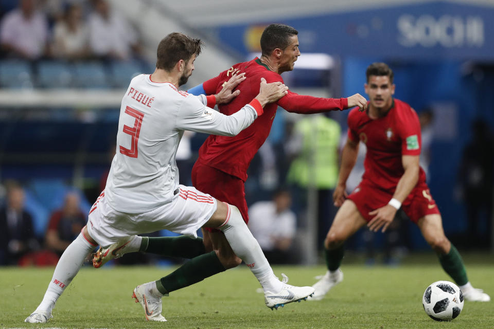 Should this tackle from Gerard Pique on Cristiano Ronaldo been a foul? (Getty)