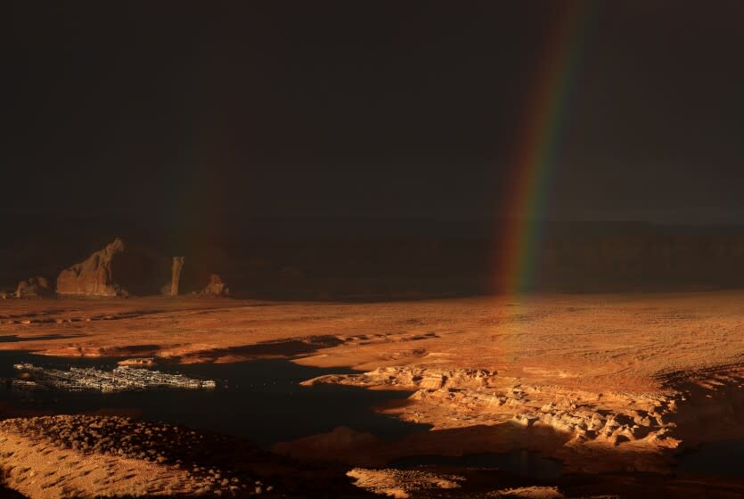 A rainbow hangs over Lake Powell on March 28, 2022 in Page, Arizona.