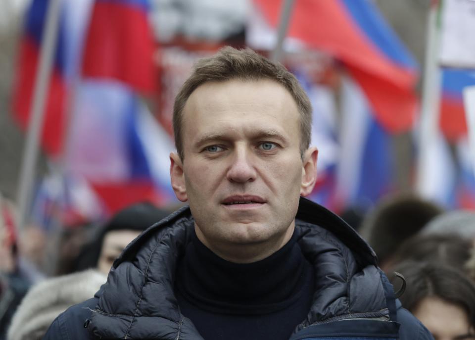 Russian opposition activist Alexei Navalny takes part in a march in memory of opposition leader Boris Nemtsov in Moscow, Russia, Sunday, Feb. 24, 2019. Thousands of Russians took to the streets of downtown Moscow to mark four years since Nemtsov was gunned down outside the Kremlin. (AP Photo/Pavel Golovkin)