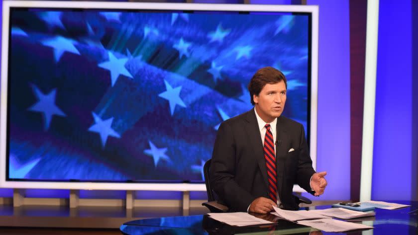 MANHATTAN, NEW YORK, OCTOBER 1, 2018 Tucker Carlson is seen in the studio on the set of his show on FOX News in Manhattan, NY. After flicking out at CNN and MSNBC, Carlson now has the most successful show on Fox News. He also has a new book that serves as a viewer guide to his show, Ship of Fools that comes out this week. 10/1/2018 Photo by Jennifer S. Altman/For The Times