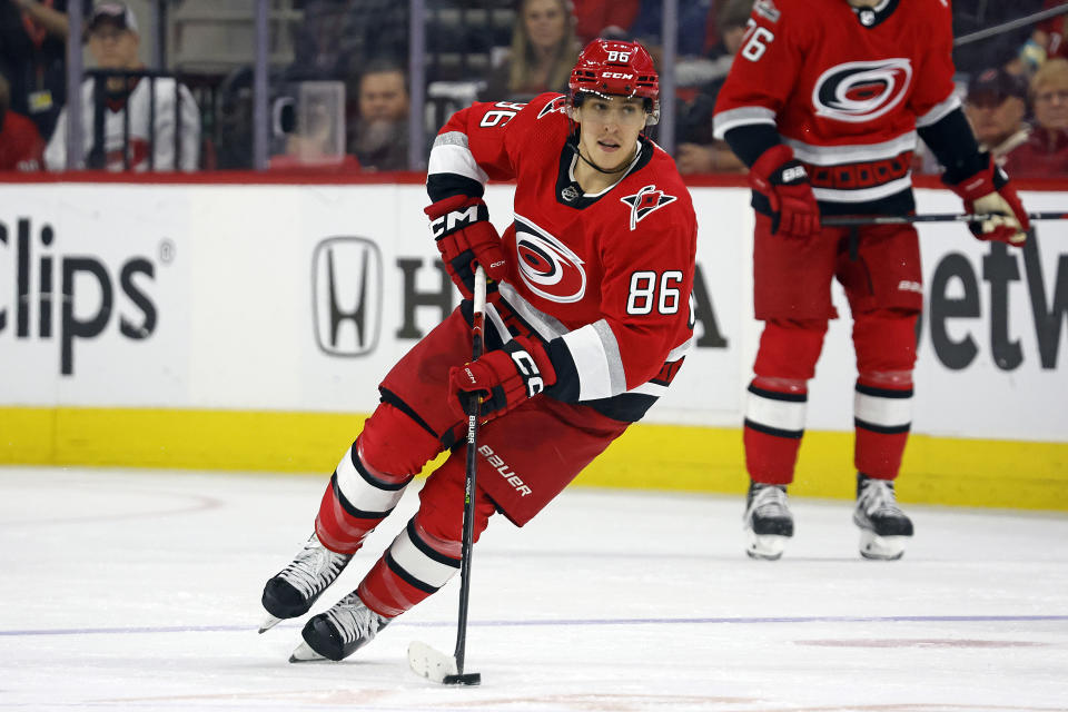 Carolina Hurricanes' Teuvo Teravainen skates with the puck during the second period of Game 2 in the team's NHL hockey Stanley Cup first-round playoff series against the New York Islanders in Raleigh, N.C., Wednesday, April 19, 2023. (AP Photo/Karl B DeBlaker)
