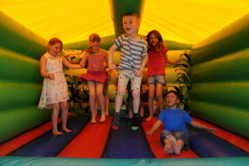 Daily Echo: May Fair bouncy castle fun
