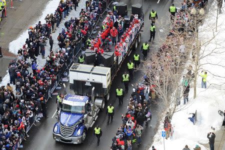 Feb 4, 2015; Boston, MA, USA; The New England Patriots cheerleaders travel down Boylston Street during the Super Bowl XLIX rolling rally parade. Brian Fluharty-USA TODAY Sports