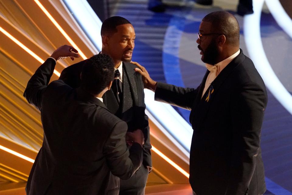 Will Smith with Sean Combs (left) and Tyler Perry in the audience at the 2022 Oscars.