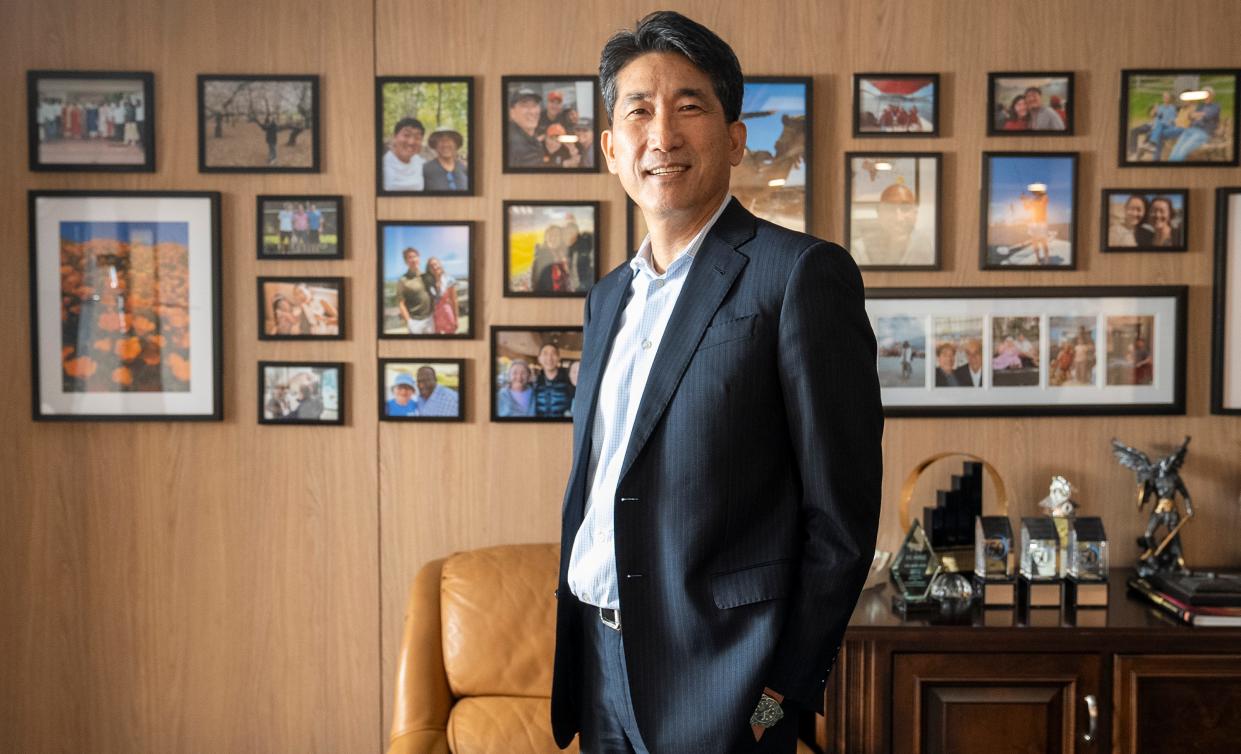 Charley Shin, founder and CEO of Charleys Cheesesteaks, stands in his office in the Gosh Enterprises headquarters in Upper Arlington. Shin founded Charleys Cheesesteaks as an OSU student in the 1980s and has built his company into a nationwide chain. Shin is sole owner of Gosh Enterprises, which also owns the BIBIBOP Asian Grill chain.