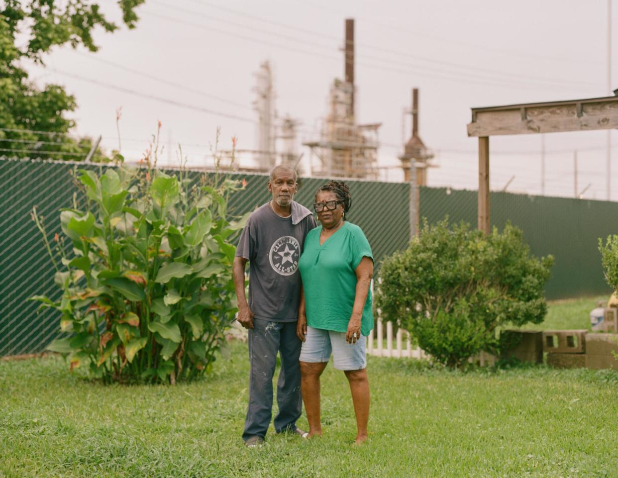 <span>Randy and Dedra Moses of St Rose, Louisiana, in their front yard. The Moseses do not feel it is safe for their grandchildren to grow up in the area.</span><span>Photograph: Rita Harper/The Guardian</span>