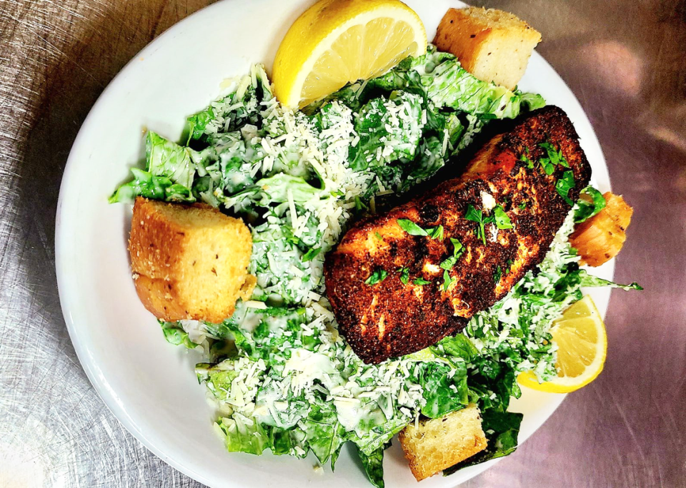 Restaurant X Bistro’s Blackened Salmon Caesar Salad is available at lunch, served Wednesday through Saturday.