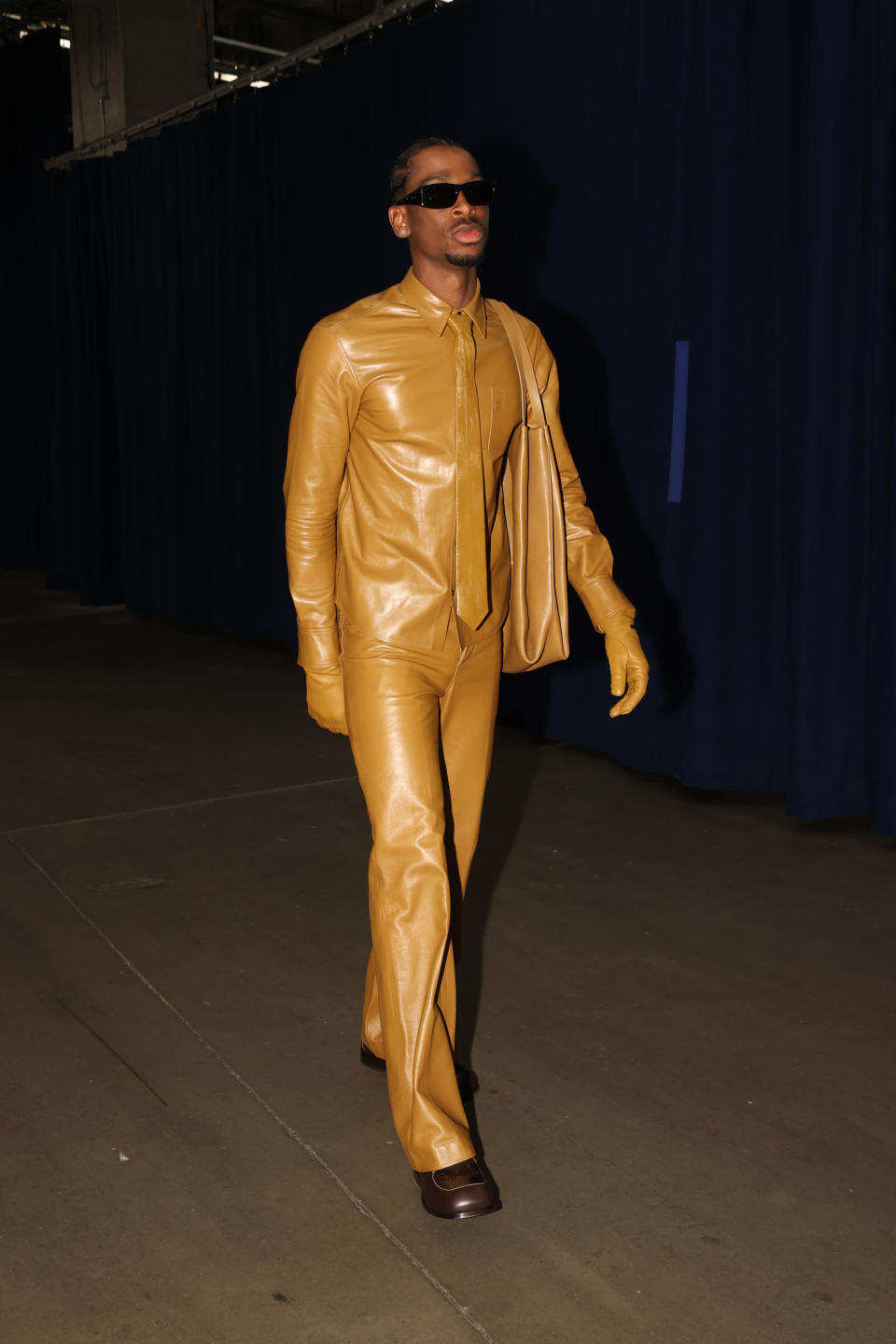 Shai Gilgeous-Alexander of the Oklahoma City Thunder arrives at the arena before the game against the Dallas Mavericks during Round 2 Game 1 of the 2024 NBA Playoffs on May 7, 2024 at Paycom Arena in Oklahoma City, Oklahoma.