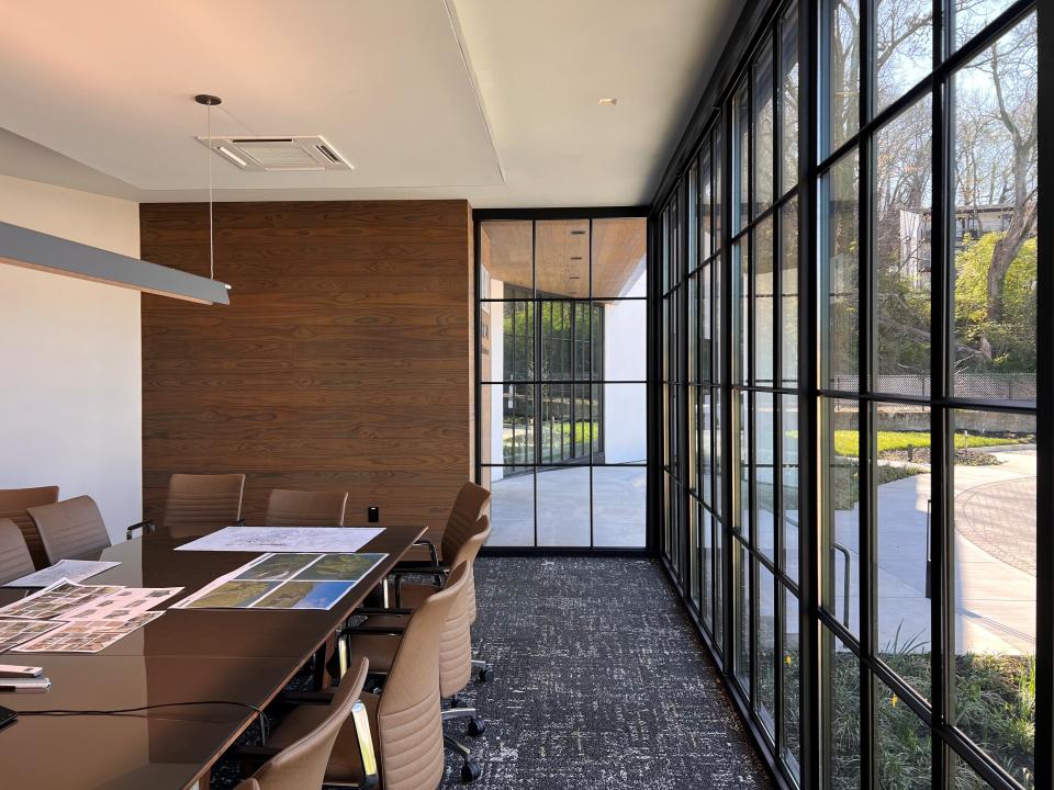 At its new South Knoxville headquarters, Johnson Architecture added a glass, wood and steel box to an existing building to serve as the main conference room. An open house was held May 9, 2024.