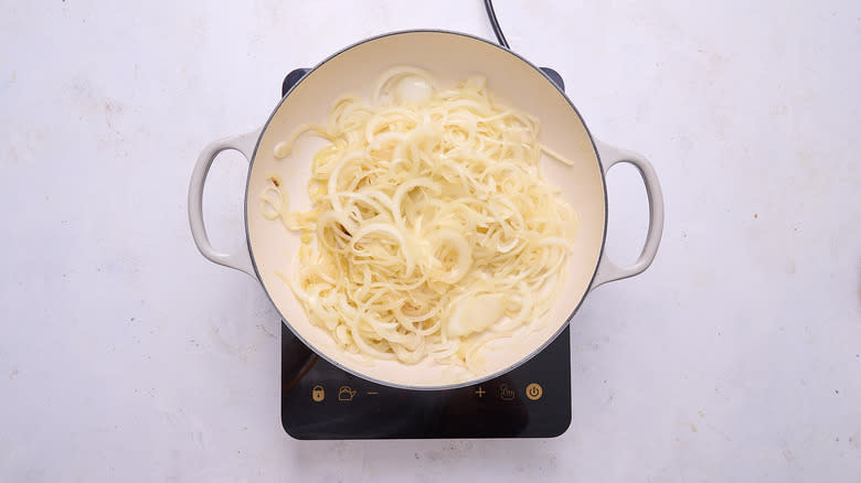 softening onions in a skillet