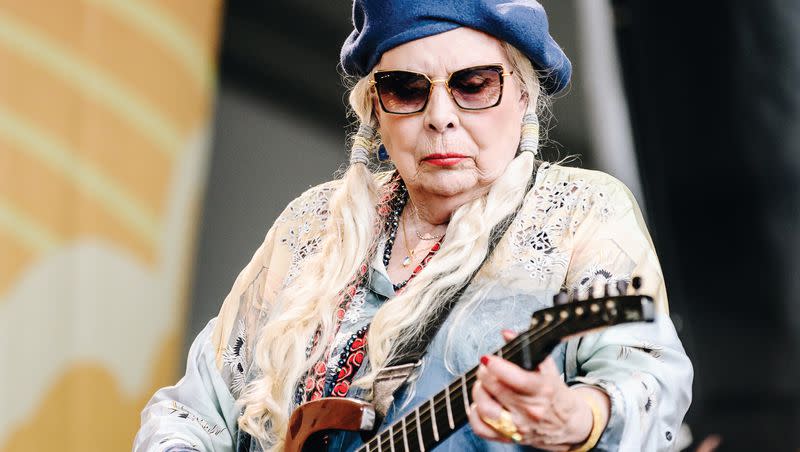 Joni Mitchell performs at the Newport Folk Festival on July 24, 2022. A full live recording of that surprise performance releases July 28.
