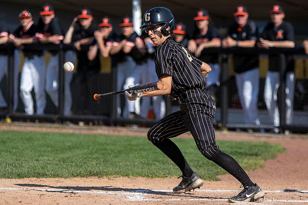 Galesburg junior Charlie Lardi singles on a bunt in the bottom of the second inning in a non-conference game against Normal Community on Monday, May 9, 2022 at Jim Sundberg Field.