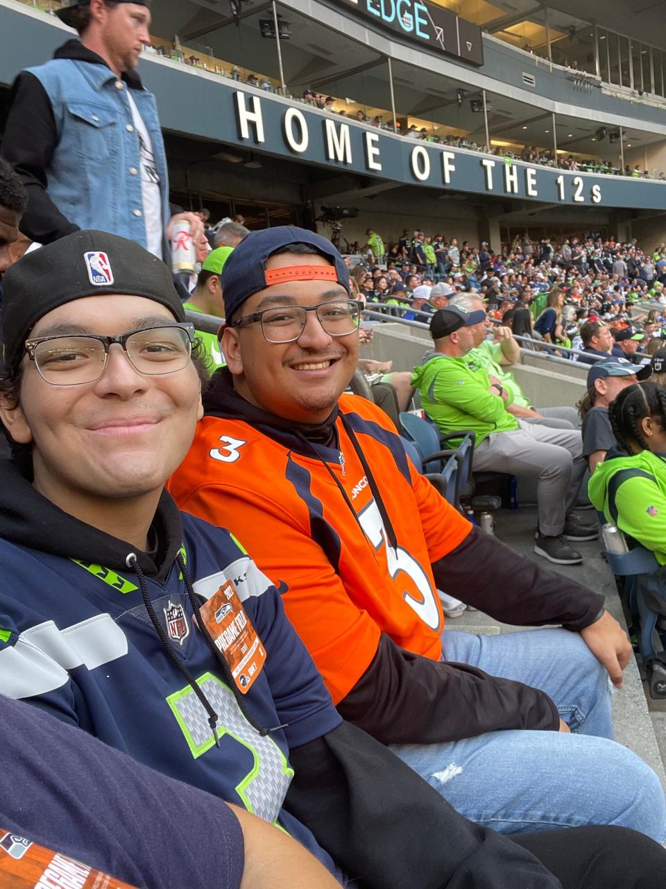 Adan Munoz and his brother, Gustavo, pose for a photo at a Seattle Seahawks game last September. Munoz passed away on April 15, 2023 after battling acute myeloid leukemia, a cancer of the bone marrow and blood.