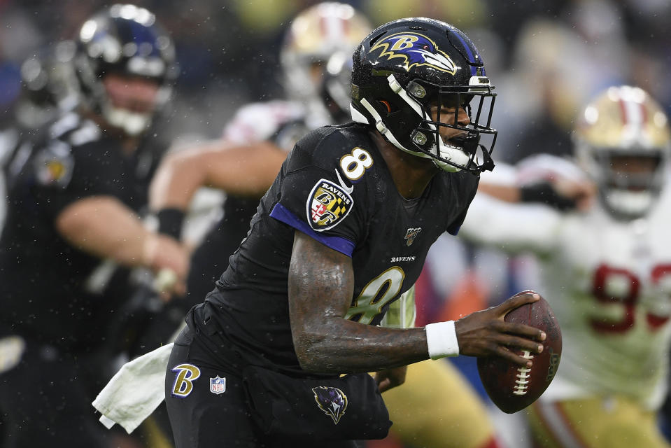 Baltimore Ravens quarterback Lamar Jackson (8) looks to pass the ball in the first half of an NFL football game against the San Francisco 49ers, Sunday, Dec. 1, 2019, in Baltimore, Md. (AP Photo/Nick Wass)