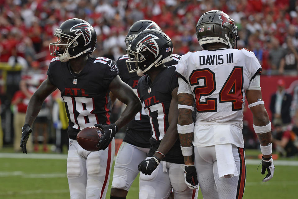 Atlanta Falcons wide receiver Calvin Ridley (18) celebrates his touchdown with teammates against the Tampa Bay Buccaneers during the second half of an NFL football game Sunday, Sept. 19, 2021, in Tampa, Fla. (AP Photo/Jason Behnken)