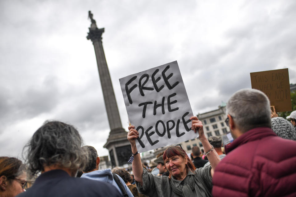 A woman makes a plea to "free the people".