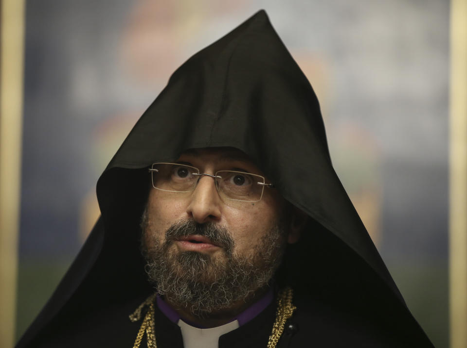 Bishop Sahak Masalyan speaks during a special ceremony after his election as the new Patriarch of Turkey's Armenian community, in Istanbul, Wednesday, Dec. 11, 2019. Armenian community voted on Wednesday Masalyan as its new patriarch, in an election critics say was overshadowed by Turkish government intervention. (AP Photo/Emrah Gurel)