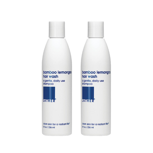 two bottles of LATHER Bamboo Lemongrass shampoo against white background