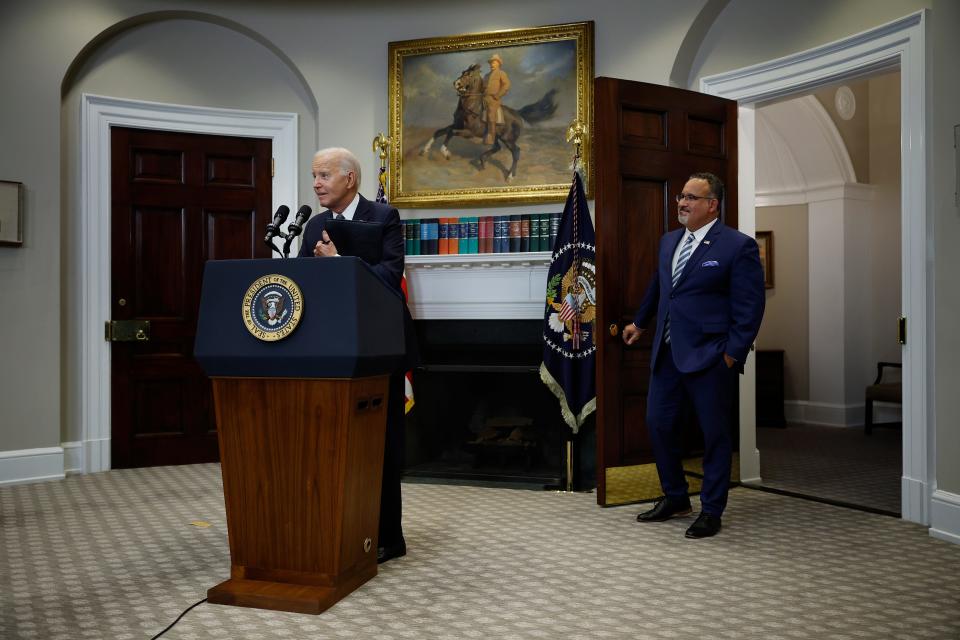 President Joe Biden is joined by Education Secretary Miguel Cardona as he announces new actions to protect borrowers after the Supreme Court struck down his student loan forgiveness plan in the Roosevelt Room at the White House on June 30, 2023.