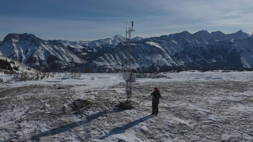 A weather station on top of a mountain can monitor snow pack and glacier melt.