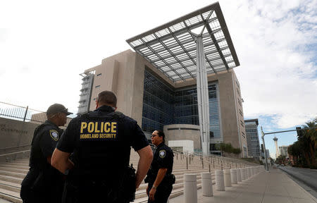 Federal Protective Service officers gather outside the federal courthouse as jury selection begins for Nevada rancher Cliven Bundy, two of his sons and co-defendant Ryan Payne, in Las Vegas, Nevada, U.S. October 30, 2017. REUTERS/Las Vegas Sun/Steve Marcus