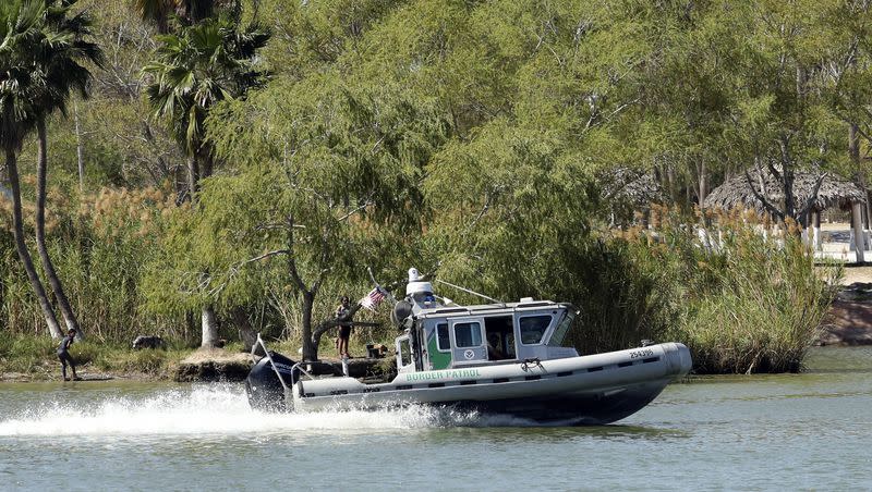 U.S. Border Patrol agents patrol the Rio Grande by boat near the Mexican side of the river near Anzalduas Park, Friday, March 3, 2023, in Mission, Texas.