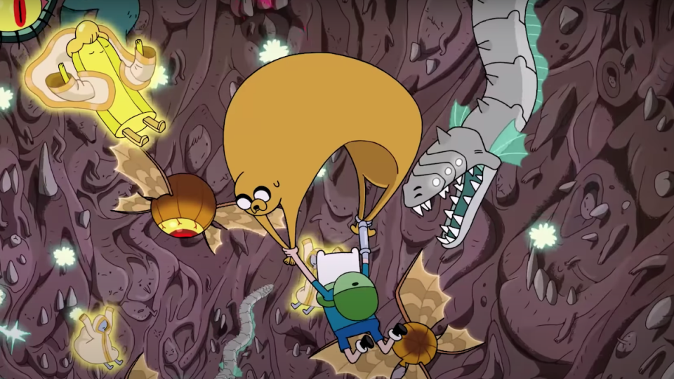 Finn uses Jake as a parachute as they soar through a cave of monsters.