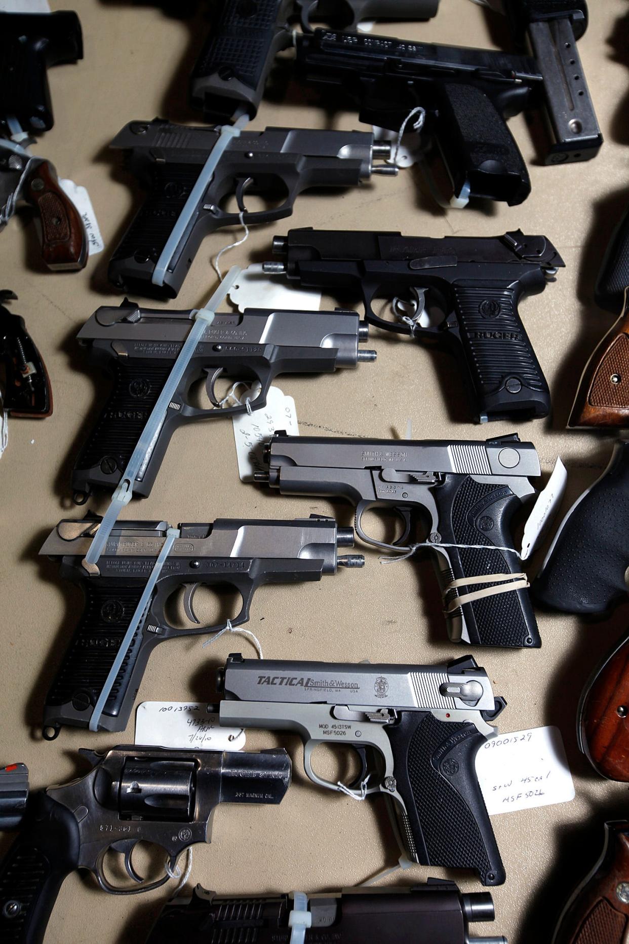 A file photo of an assortment of weapons at the Columbus Division of Police property room.