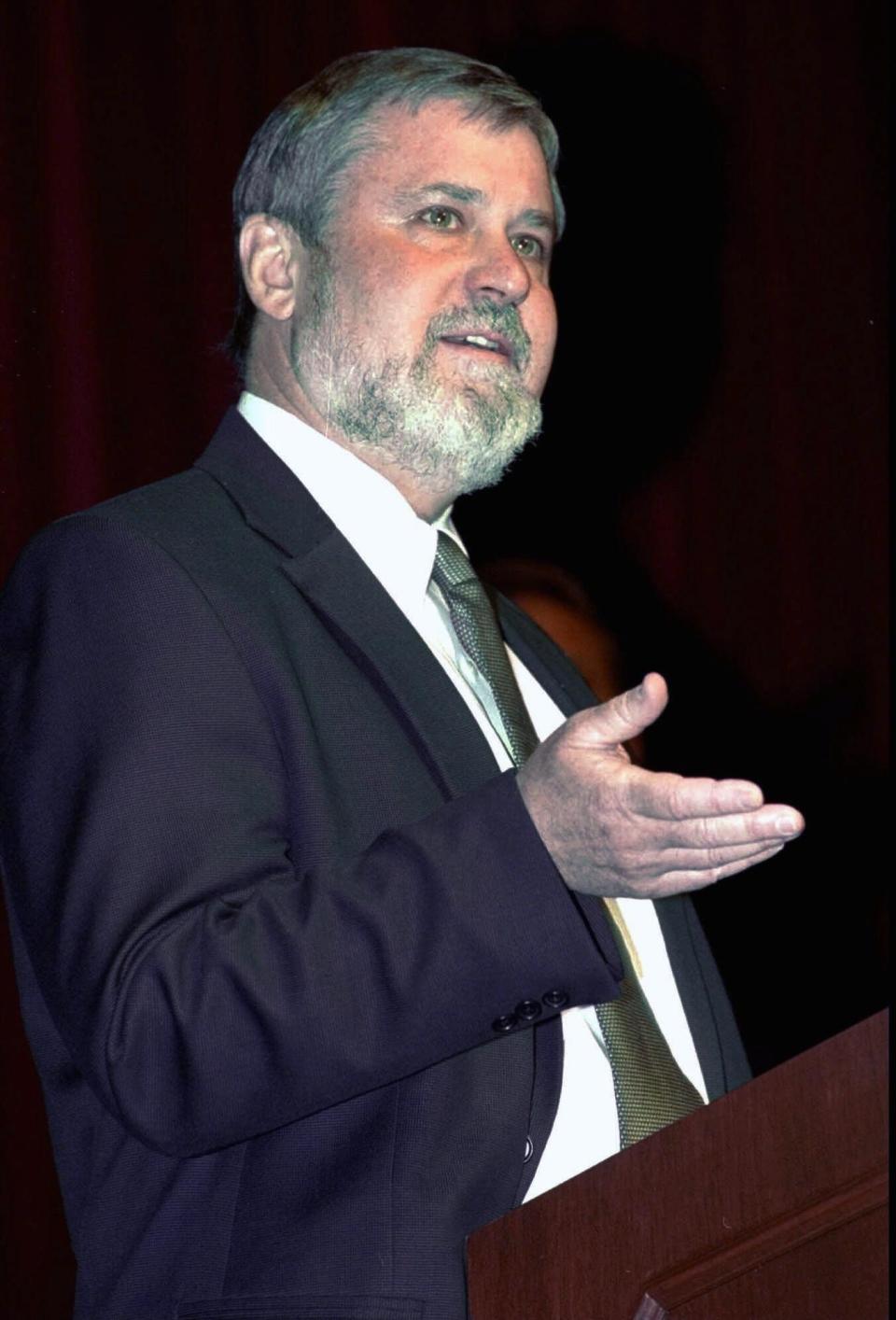 FILE - Larry Arnn, president of Hillsdale College in Hillsdale, Mich., speaks at a news conference in Jackson, Mich., April 5, 2000. When local school officials voted down a charter school linked to Hillsdale College this summer, staffers at the state commission that would soon have to decide whether to let the controversial school open anyway reacted with shock at how things unfolded. The text messages they exchanged, obtained through a records request by The Associated Press, showed the close attention state staffers paid to the school board's resounding rejection in the wake of Arnn’s disparaging comments about teachers. When no one showed up to make the case for the Hillsdale-affiliated charter school application, the alarm among those who would be left holding the bag was palpable. (Bob Keyes/Jackson Citizen Patriot via AP, File)