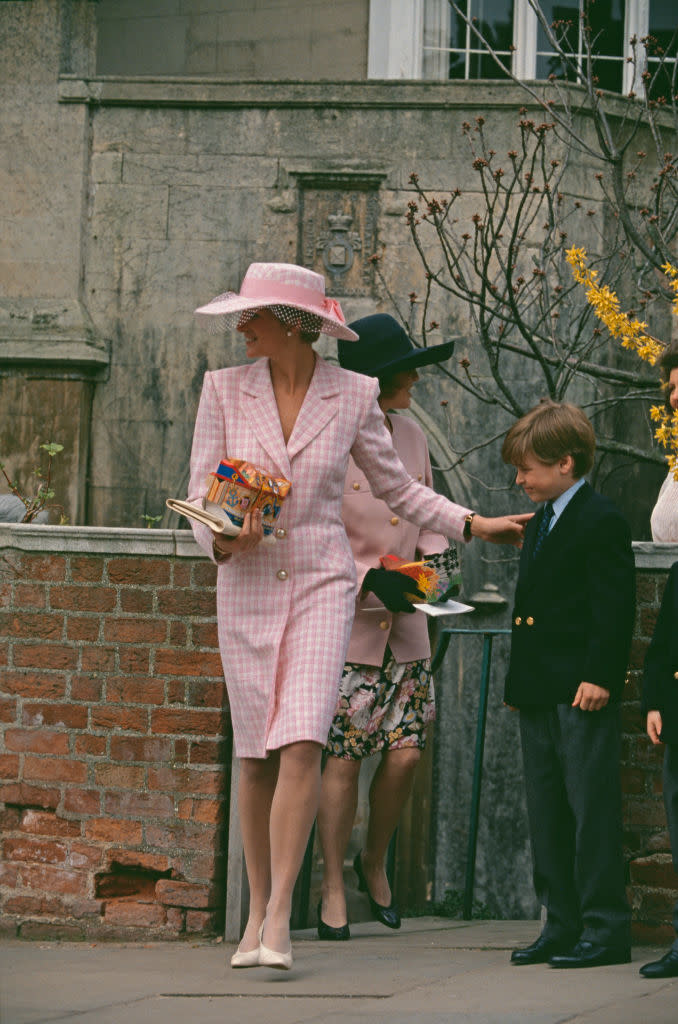 easter outfit fashion style, catherine walker coat dress,  Diana, Princess of Wales  (1961 - 1997) with her son Prince Harry and the Duchess of York at St George's Chapel, Windsor, for the Easter service, 31st March 1991.   (Photo by Jayne Fincher/Princess Diana Archive/Getty Images)