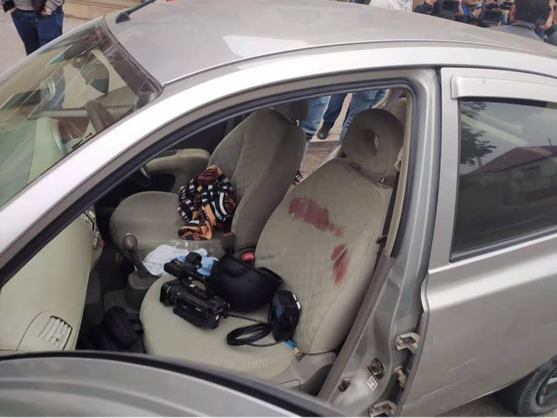 Bloodstains and equpment are seen in a car of Armenian reporters, after it was damaged during a recent shelling, in the town of Martuni in the breakaway region of Nagorno-Karabakh