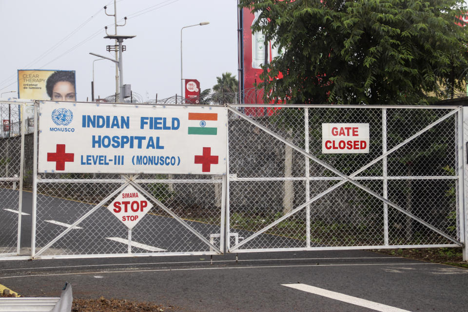 The gate of the United Nations hospital where the Italian ambassador to Congo was taken after the convoy in which he was travelling was attacked, in Goma, North Kivu province, Congo Monday, Feb. 22, 2021. The Italian ambassador to Congo Luca Attanasio, an Italian carabineri police officer and their Congolese driver were killed Monday in an attack on a U.N. convoy in an area that is home to myriad rebel groups, the Foreign Ministry and local people said. (AP Photo/Justin Kabumba)