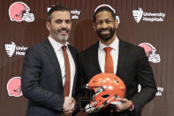 Cleveland Browns general manager Andrew Berry, right, poses for a photo with head coach Kevin Stefanski after speaking during a news conference at the NFL football team's training facility, Wednesday, Feb. 5, 2020, in Berea, Ohio. Berry returned to the team after a one-year stint in the Philadelphia Eagles' front office. Berry was the Browns' vice president of player personnel from 2016-18. (AP Photo/Tony Dejak)