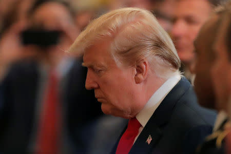 U.S. President Donald Trump arrives to host participants of the Wounded Warrior Project Soldier Ride, after the release of Special Counsel Robert Mueller's report, in the East Room of the White House in Washington, U.S., April 18, 2019. REUTERS/Lucas Jackson