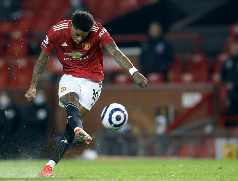 <p>Manchester United's Marcus Rashford has a shot at goal during the Premier League match at Old Trafford, Manchester. Picture date: Sunday April 4, 2021.</p>
