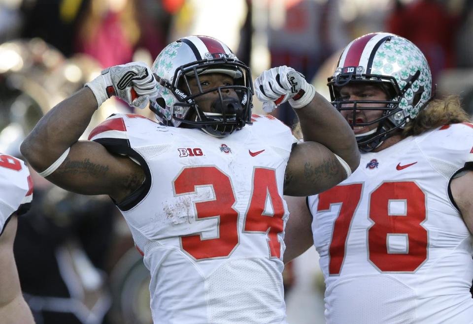 Carlos Hyde had plenty reason to celebrate with 226 rushing yards and a TD in OSU's win. (AP)